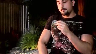 Cute young smoker works on his stiff dick and spunks