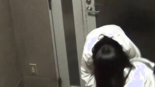 Naughty Japanese schoolgirl pissing in a public building