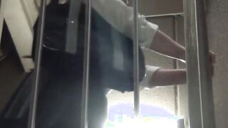 Naughty Japanese schoolgirl pissing in a public building