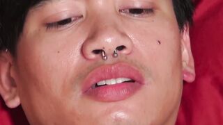 Asian cutie toys his tight ass and tugs his pierced cock