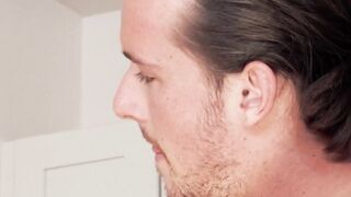 Plumber Dan Saxton pounds assistant Beaux Banks tight hole