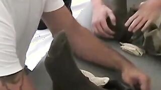 Davis also gets restrained and tickled by three buddies