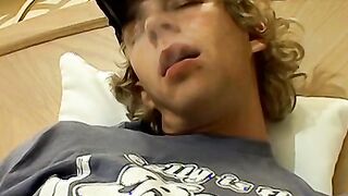 Blonde twink Casey Wood jerks off his dong while smoking