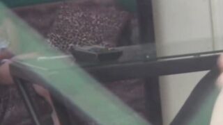 Japanese chick plays with her pussy while watching hot porn