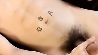 Skinny twink massages his feet and strokes massive dick