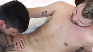 Hairy jock friend fucks his tattooed buddy in his bedroom