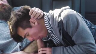 Bearded stepdad bare fucks his cute stepson on the backseat