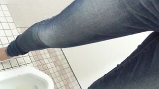 Japanese chick with hairy pussy peeing in public toilet