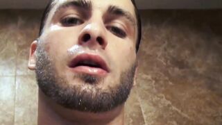 Handsome amatuer jock milking his dick for cum after shower