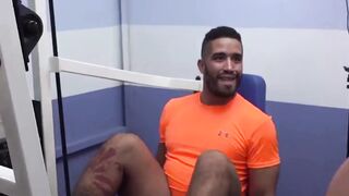 Two dudes take things to the bathroom after gym session