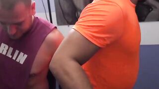 Two dudes take things to the bathroom after gym session