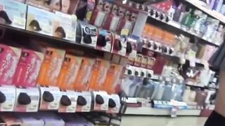 Japanese beauty taped up skirt while shopping