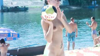 Hot nudist girl filmed by a voyeur with a hidden camera