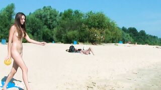 Young nudist with tiny tits that is soaking up the sun