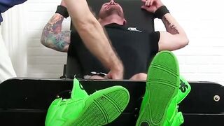 Tattooed and naked Hugh Hunter gets the tickle treatment