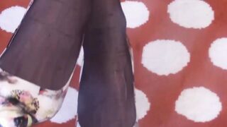 Shemale Asian beauty talks dirty during footjob