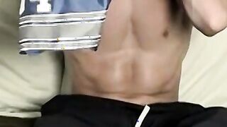 Athletic jock Gregory solo masturbates his throbbing dick