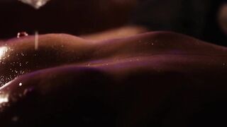 Nice guy passionately massages his date before love making