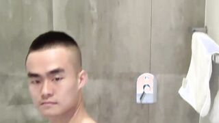 Handsome Asian amateur stroking his cock after the shower