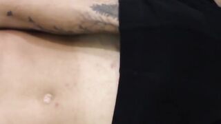 Tattooed dark skinned amateur sticks dildo on wall to play