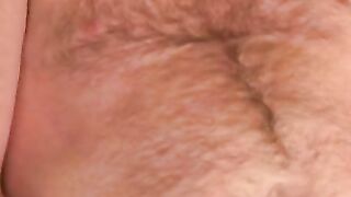 Hairy gay man tugs cock before anal play and cumshot