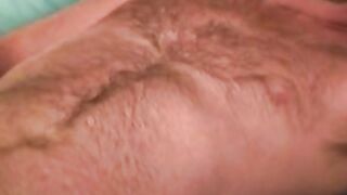 Hairy gay man tugs cock before anal play and cumshot
