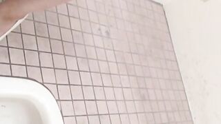 Beautiful Japanese women taking a piss in the bathroom