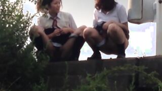 Schoolgirls from Japan peeing while taking a hike