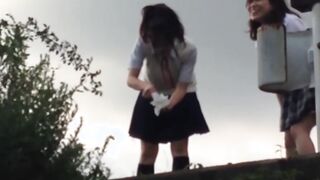 Schoolgirls from Japan peeing while taking a hike