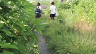 Schoolgirls from Japan peeing while taking a hike