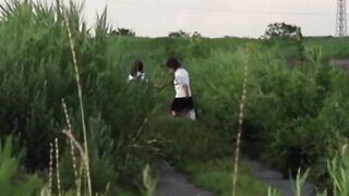 Schoolgirls from Japan peeing while taking a hike