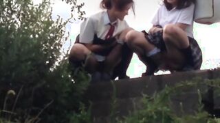 Schoolgirls from Japan peeing while taking a hike