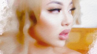 Blonde Asian MILF exposes her big curves