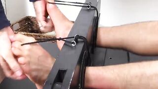 Muscular and tattooed Casey tied up and feet tickled hard