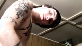 Skinny tattooed straight thug plays with his hairy cock