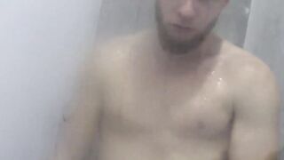Real amateur jock films his solo masturbation in bathroom