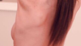 Woman with a ponytail moves around naked just to tease you
