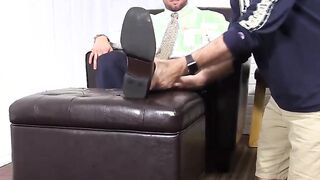 Cute business man with tattoos gets foot worshiped