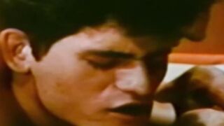 Stud goes deep inside of his partner in vintage gay video