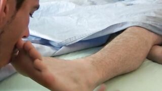 Sexy toes of a wonderful young man get sucked on very hard