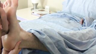 Sexy toes of a wonderful young man get sucked on very hard