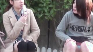 Young Japanese babe filmed toying pussy at a bus stop