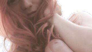 Pale redhead shows off her impeccable hips and her titties
