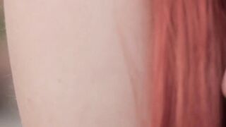 Pale redhead shows off her impeccable hips and her titties
