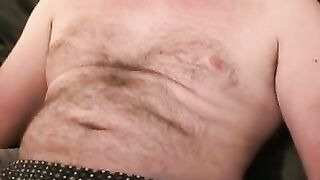 Fat hairy guy plays with his hard dick and unloads jizz