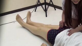 Voluptuous Japanese nurse strokes and gives blowjob to guy