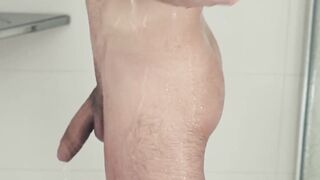 Suited stallion Hector de Silva masturbates his big cock