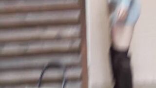 Japanese babe spreads her pussy lips and walks naked outside