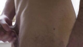 Hot and mysterious hunk masturbates before shower