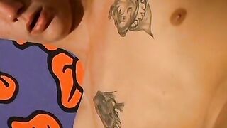 Tattooed twink wanks while wearing his favorite undies